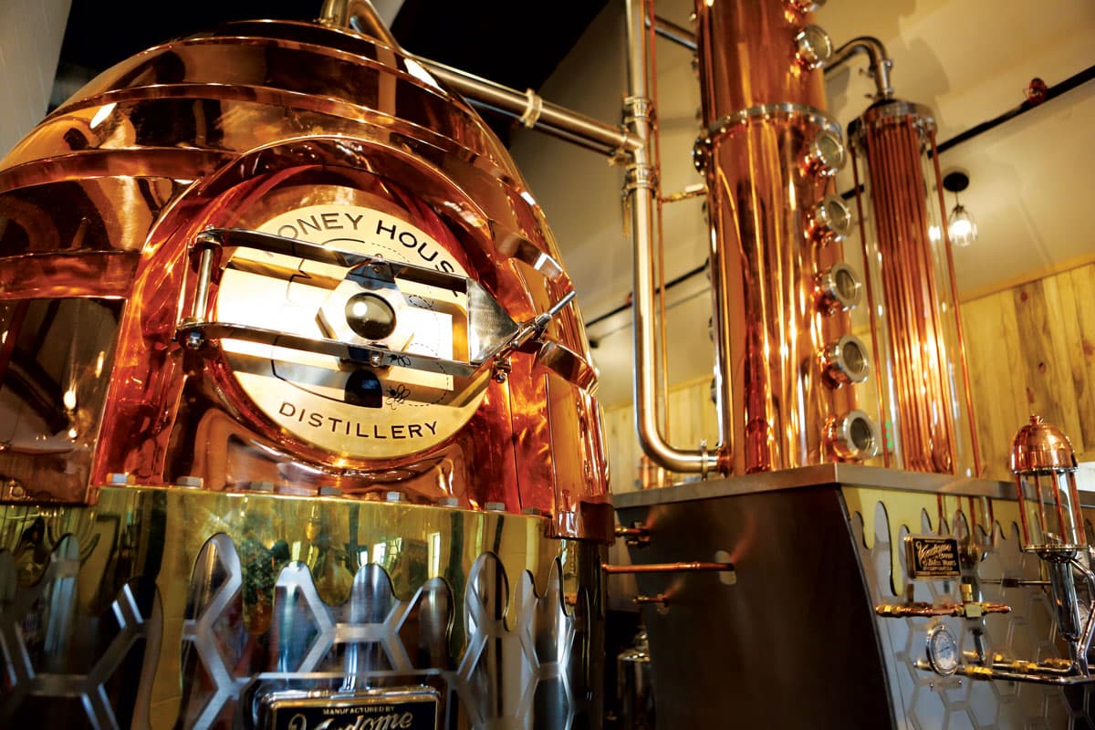 Interior Honey House Distillery in Durango with a metal machine in the foreground