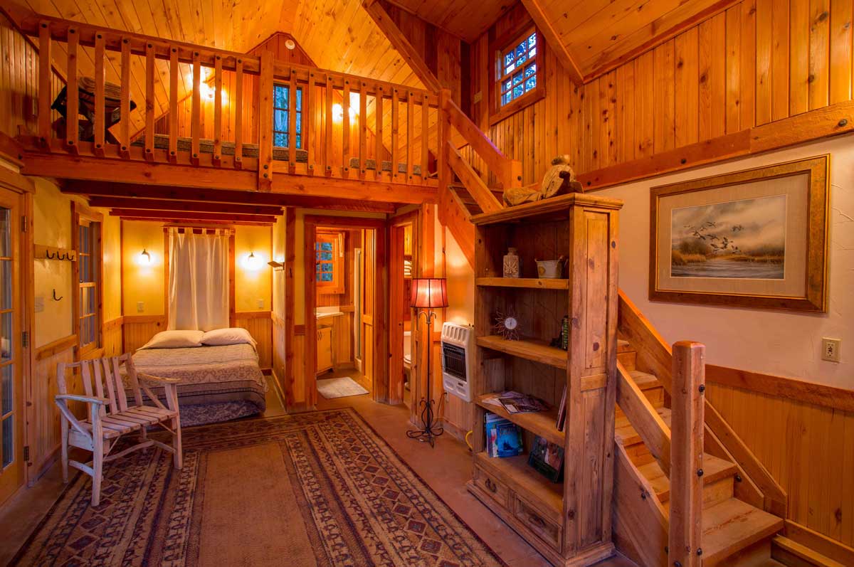 Interior of a warmly lit Gunnison River Farms cabin