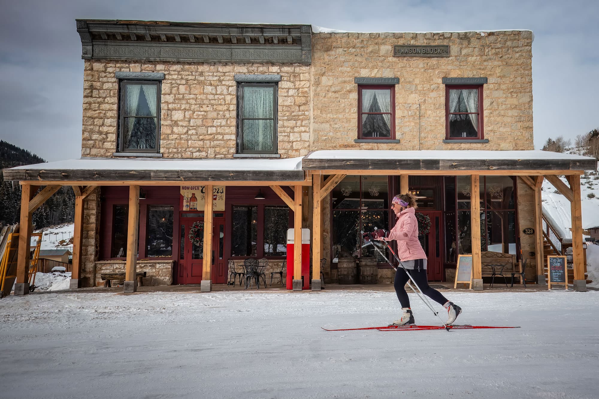A person cross-country skiing on flat surface in the town of Pitkin, Colorado.