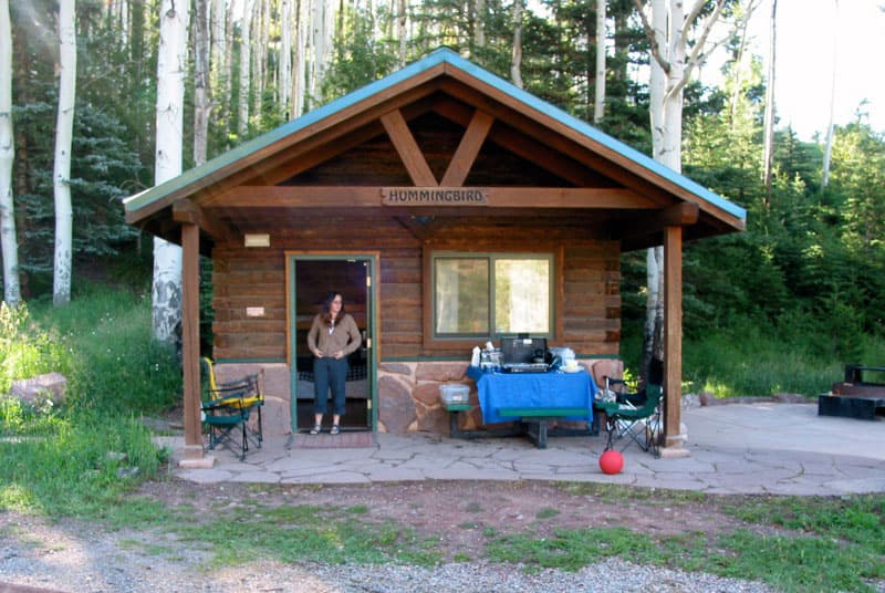 Morning sun shines on a cabin at Sylvan Lake State Park near Eagle, CO