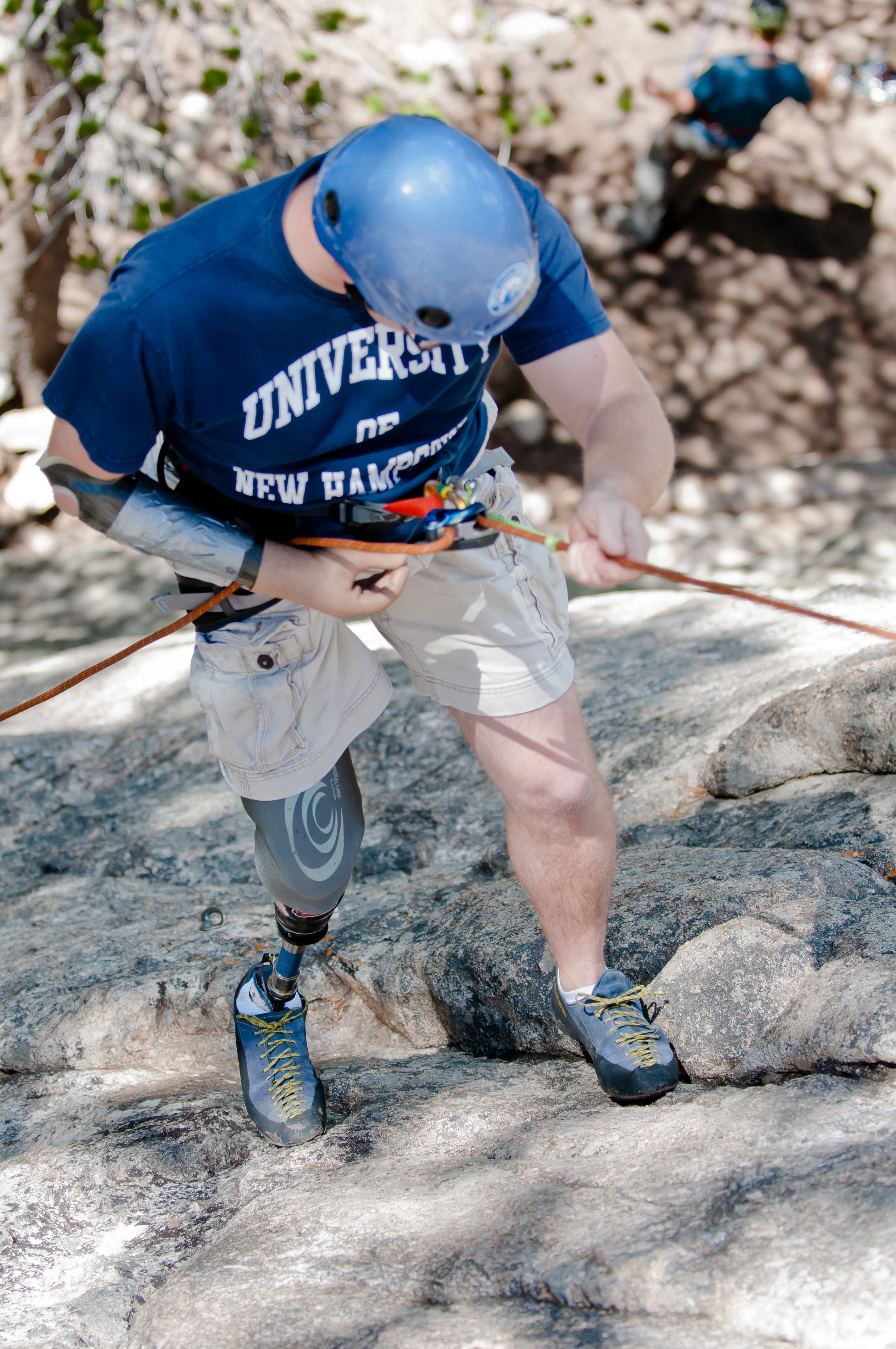 challenge aspen participant on rock climbing adventure - summer 2013 photo