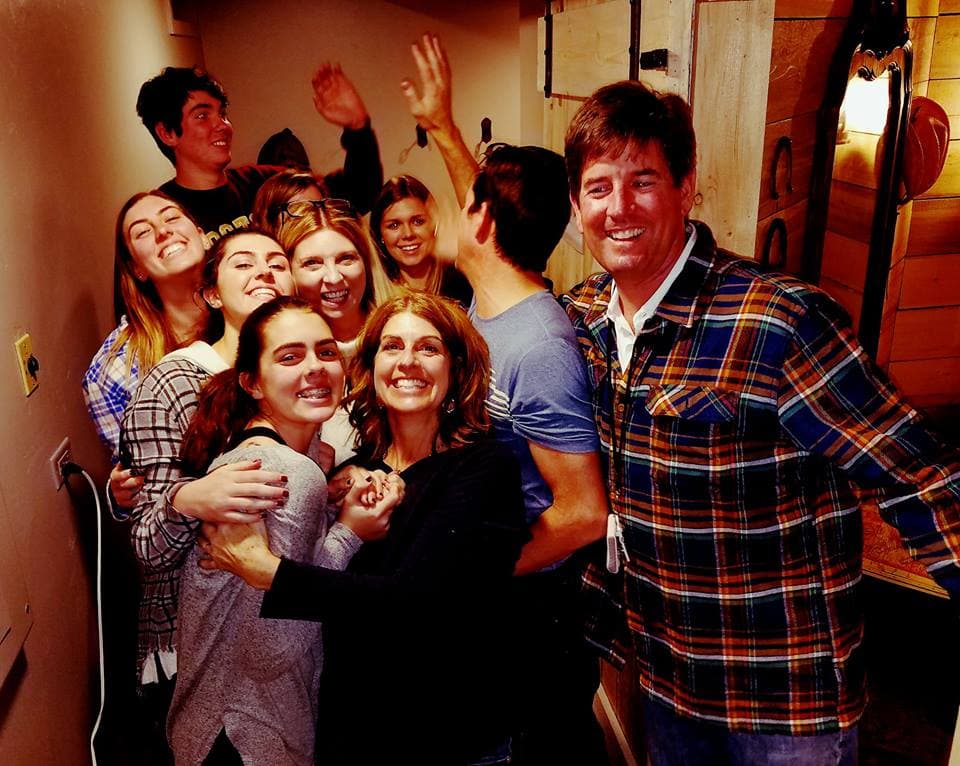 fun family memories being made at the crooked key escape rooms photo