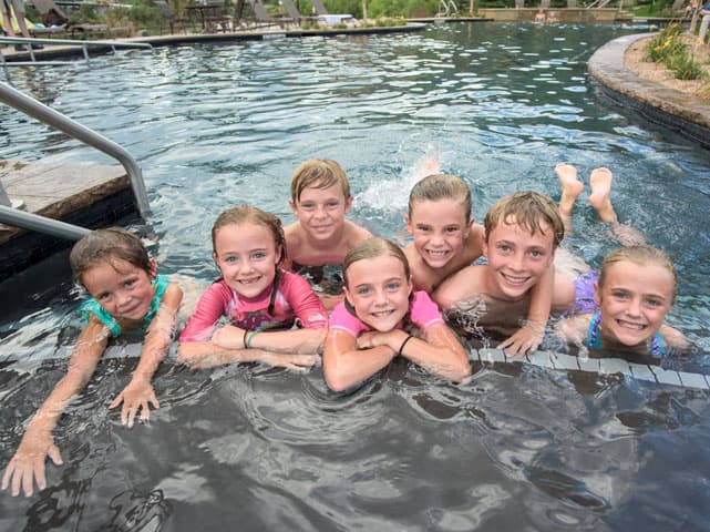 kids enjoy the thermally heated, fresh water family pool photo 17