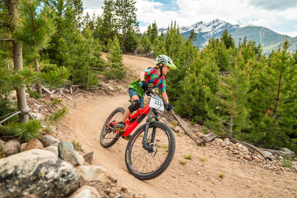 A person mountain biking at Frisco Adventure Park in Frisco, Colorado
