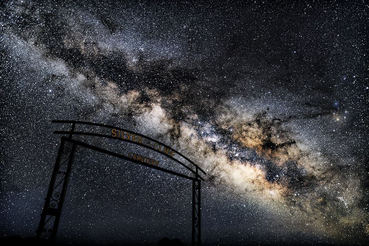 Milky Way shining bright above the Silver Cliff cemetery's sign.