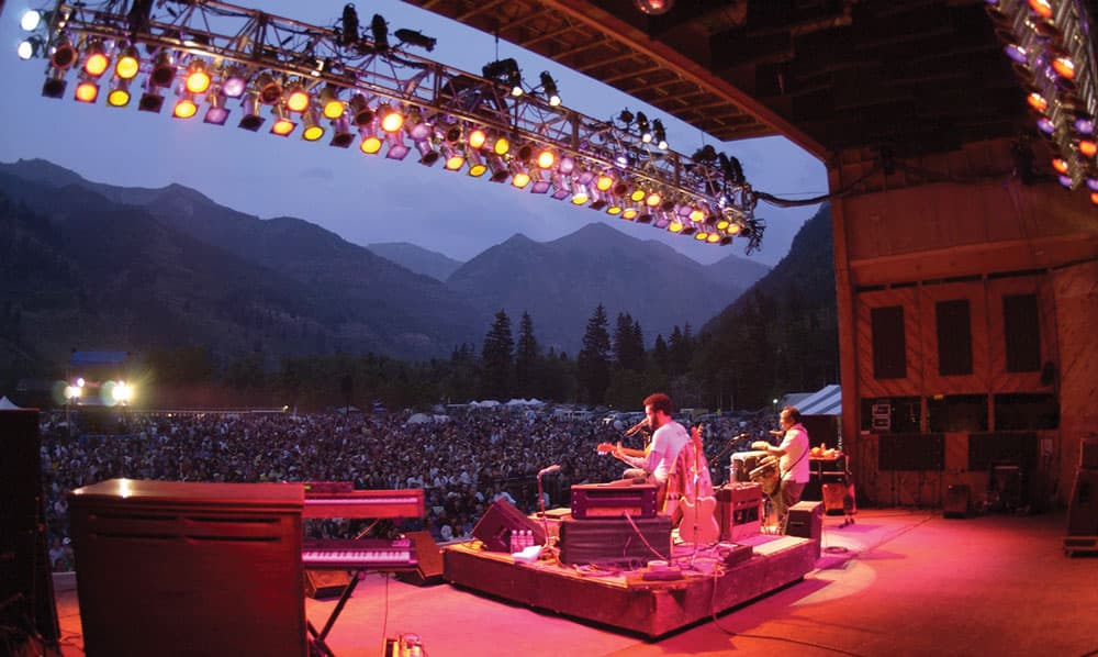 Musicians performing on stage at the Telluride Bluegrass Festival, Telluride, Colorado at night