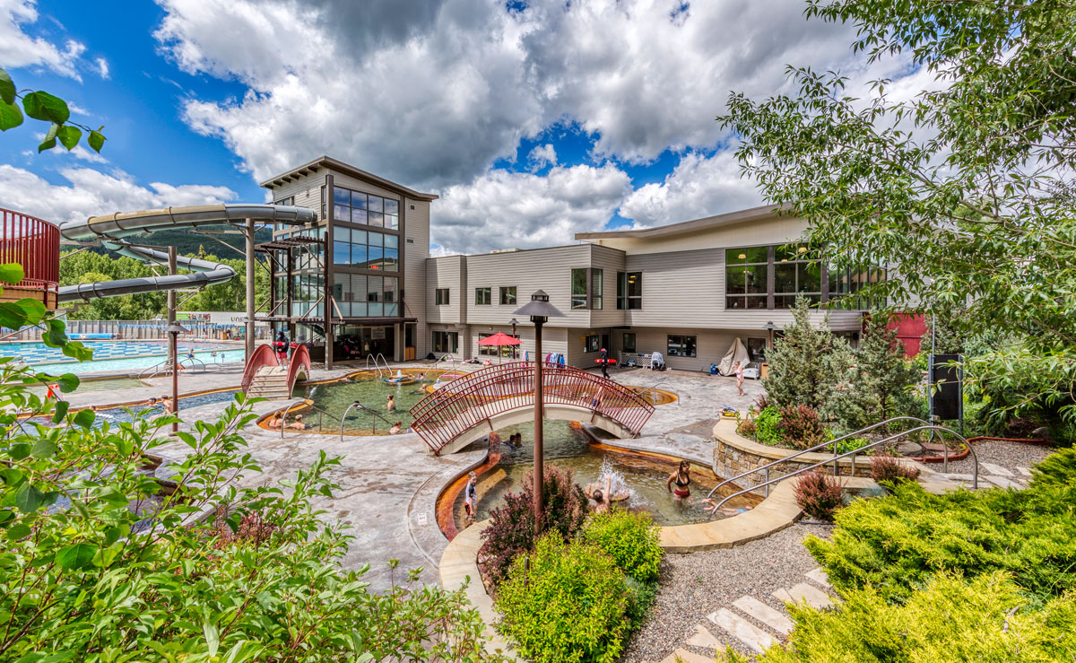 Outdoor view of Old Town Hot Springs with pools and slides in Steamboat Springs, Colorado.