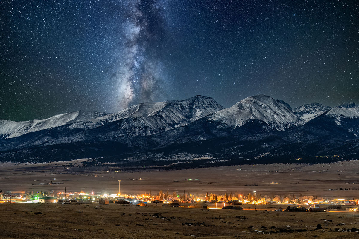 The Milky Way cuts a gash across the night sky over the Sangre de Cristo Mountains in Westcliffe, Colorado.