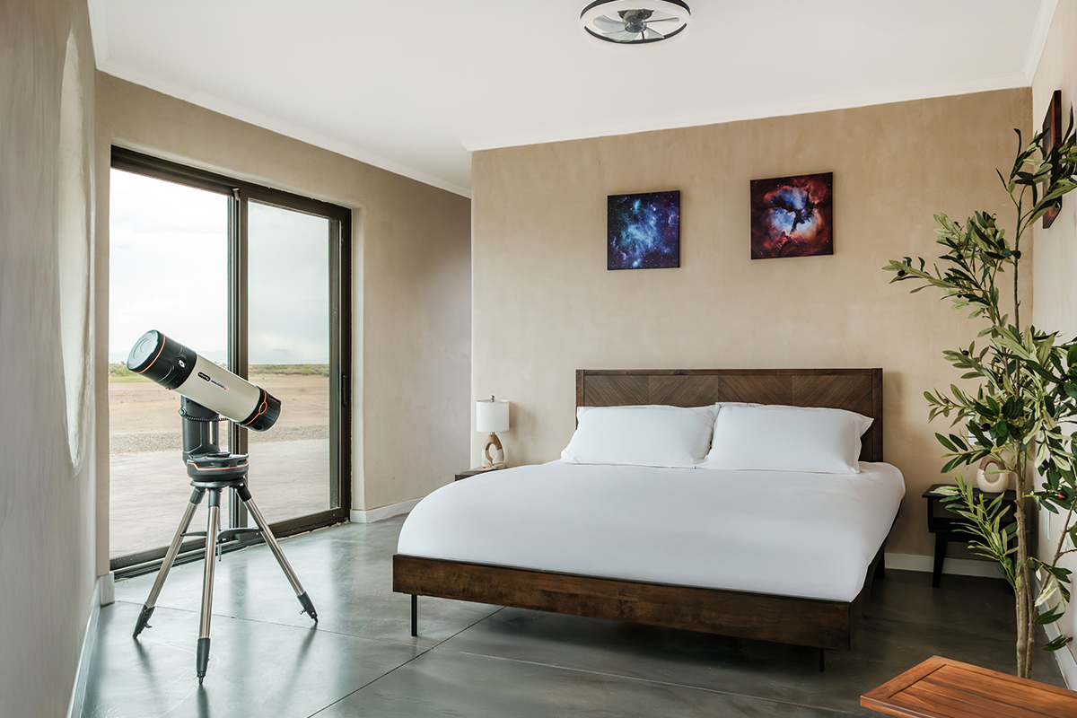 A bedroom villa at Kosmos, near Mosca, Colorado, features a high-powered telescope for guests to use as they wish.