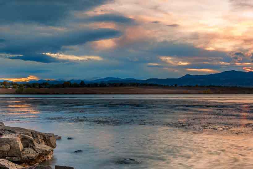 Sunset at Stanley Lake in Westminster. In the background the Front Range mountains sit.