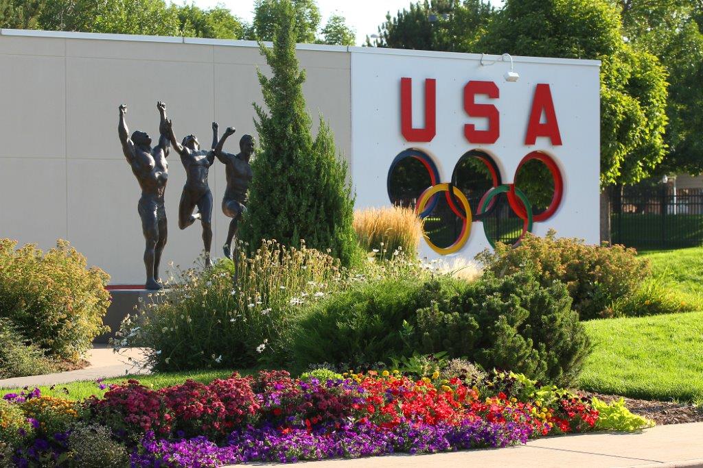 USA sign and Olympian statue outside of the The Olympic Training Center in Colorado Springs