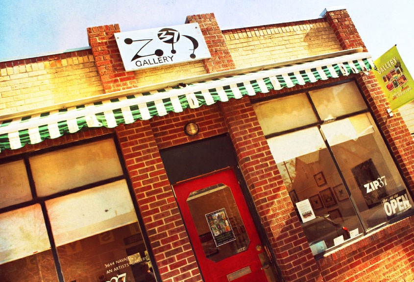 Red door outside of Zip 37 art gallery in Denver, colorado