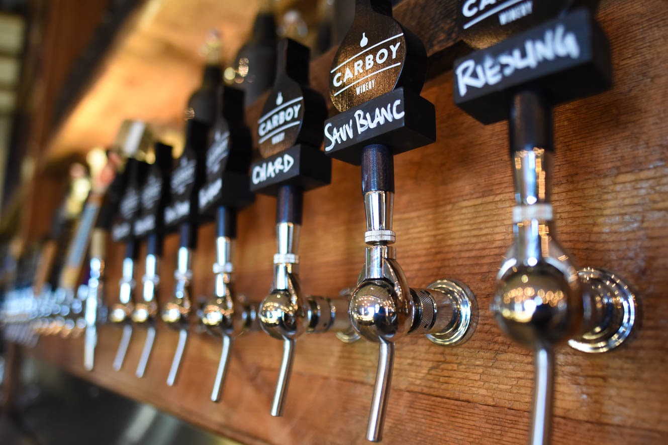 serving wine on tap and by the glass, bottle, case and carboy photo