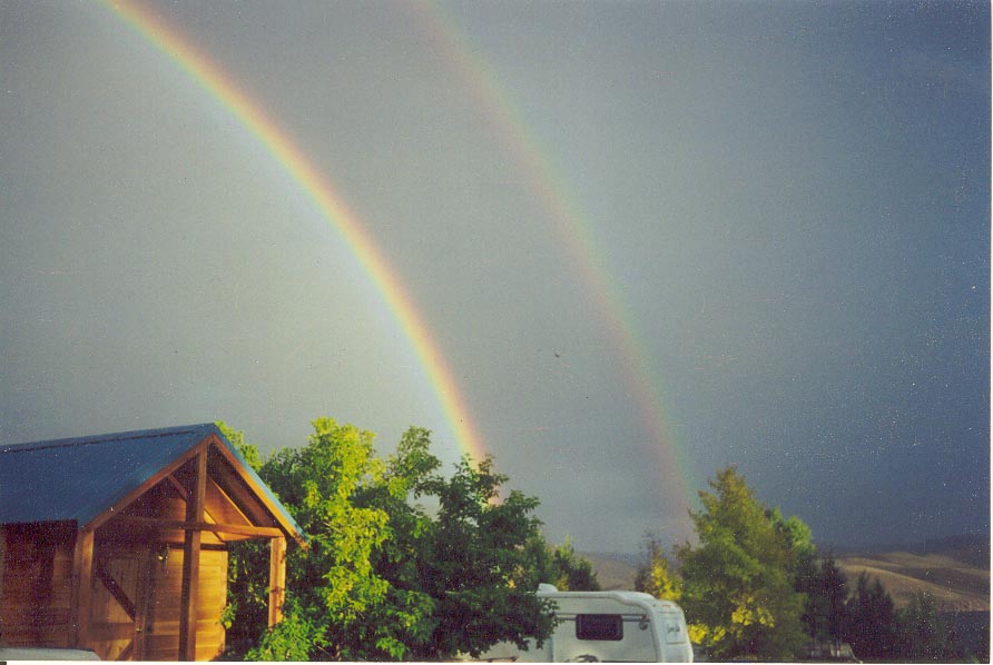 cabin and rainbow photo