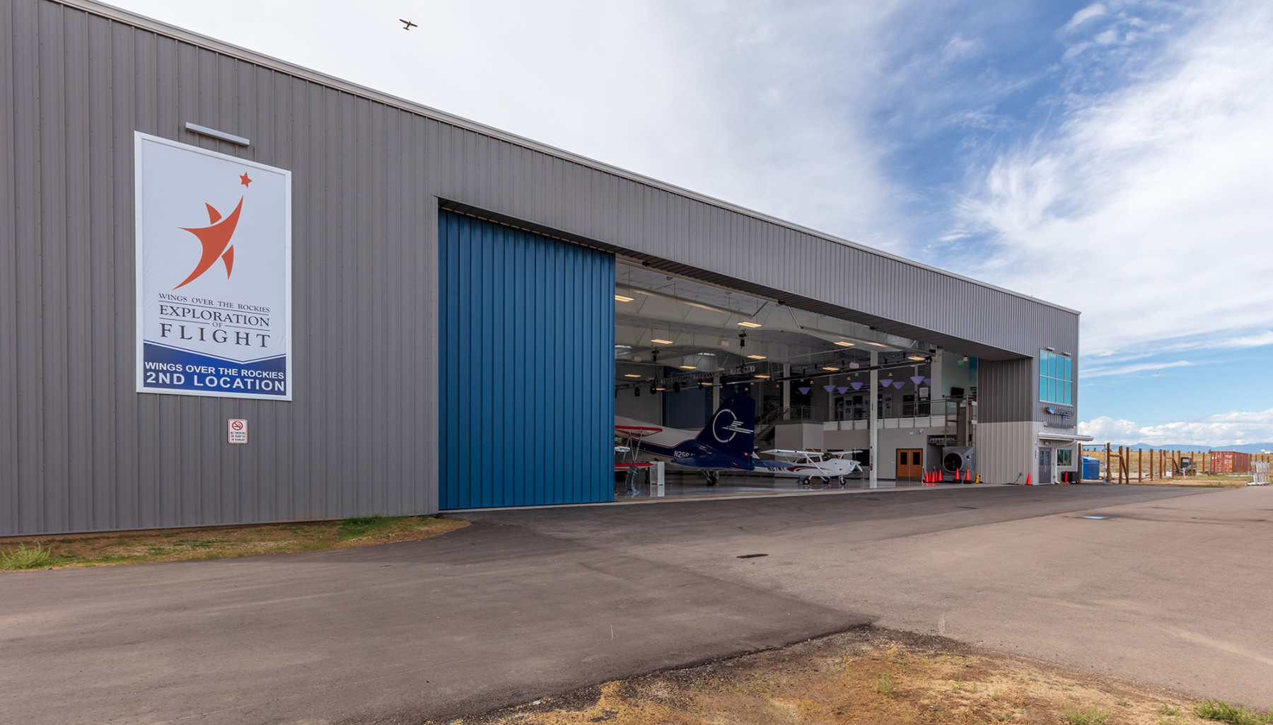 exploration of flight's open hangar doors photo