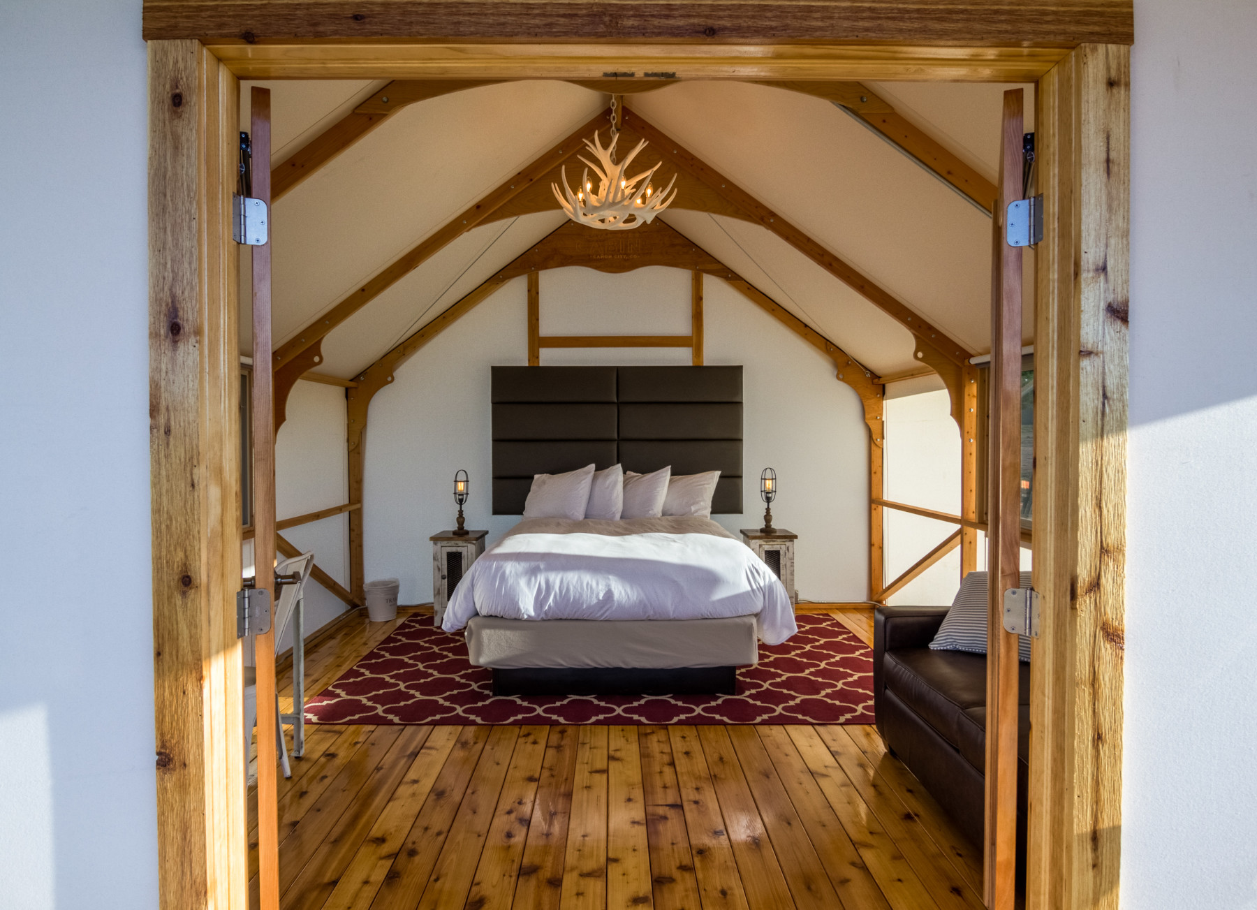 luxurious glamping tent with faux antler chandelier photo 9