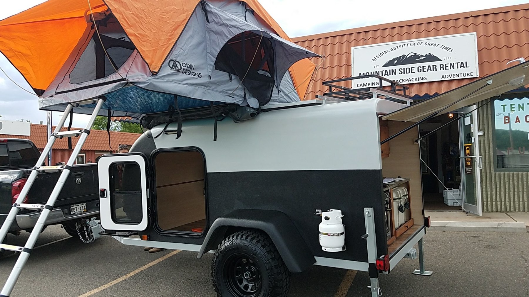 rent camping gear and trailers at mountain side photo