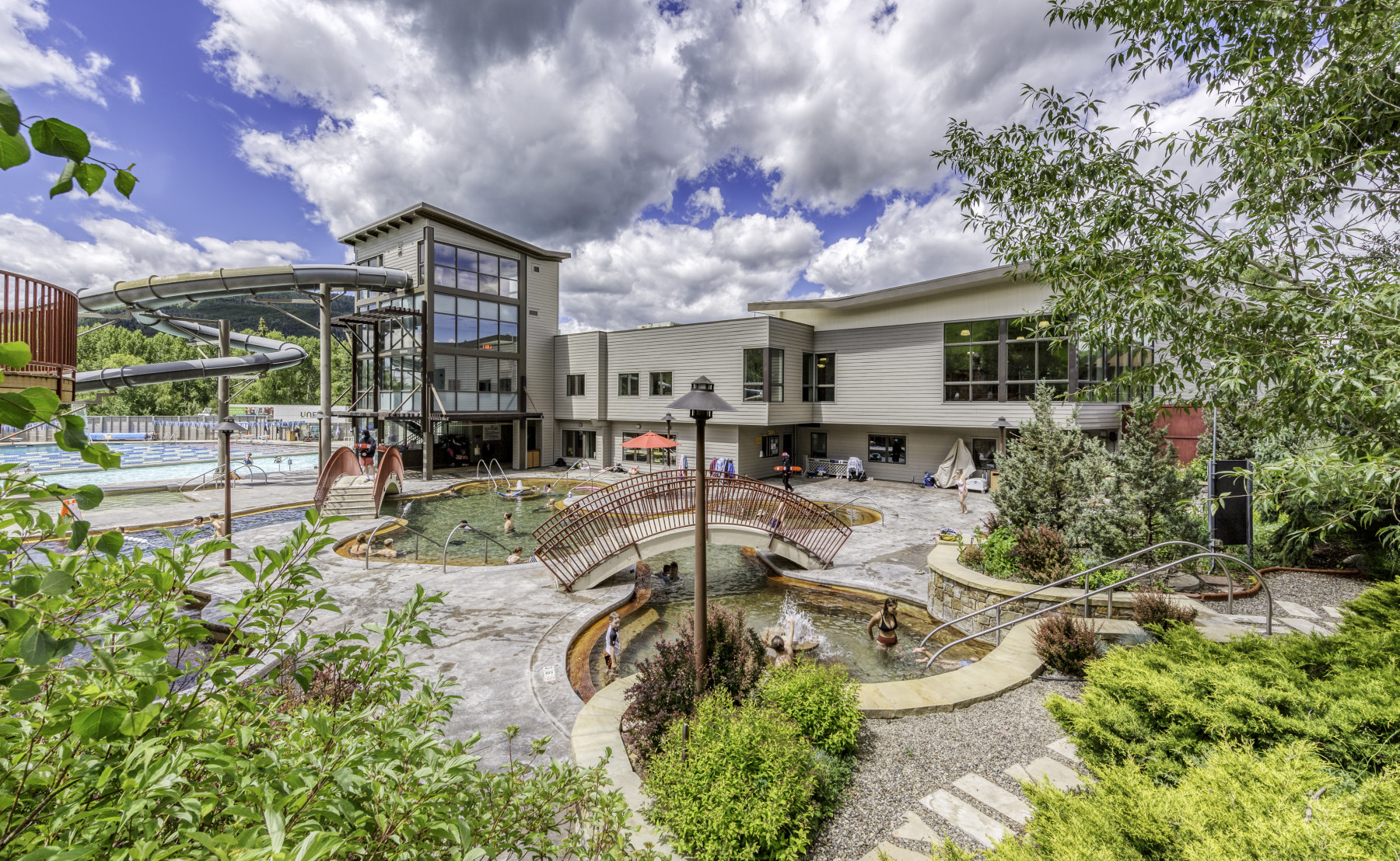 soak, relax & rejuvenate… in the year-round, natural outdoor hot spring pools at old town hot springs, right in the heart of downtown steamboat springs, colorado. photo